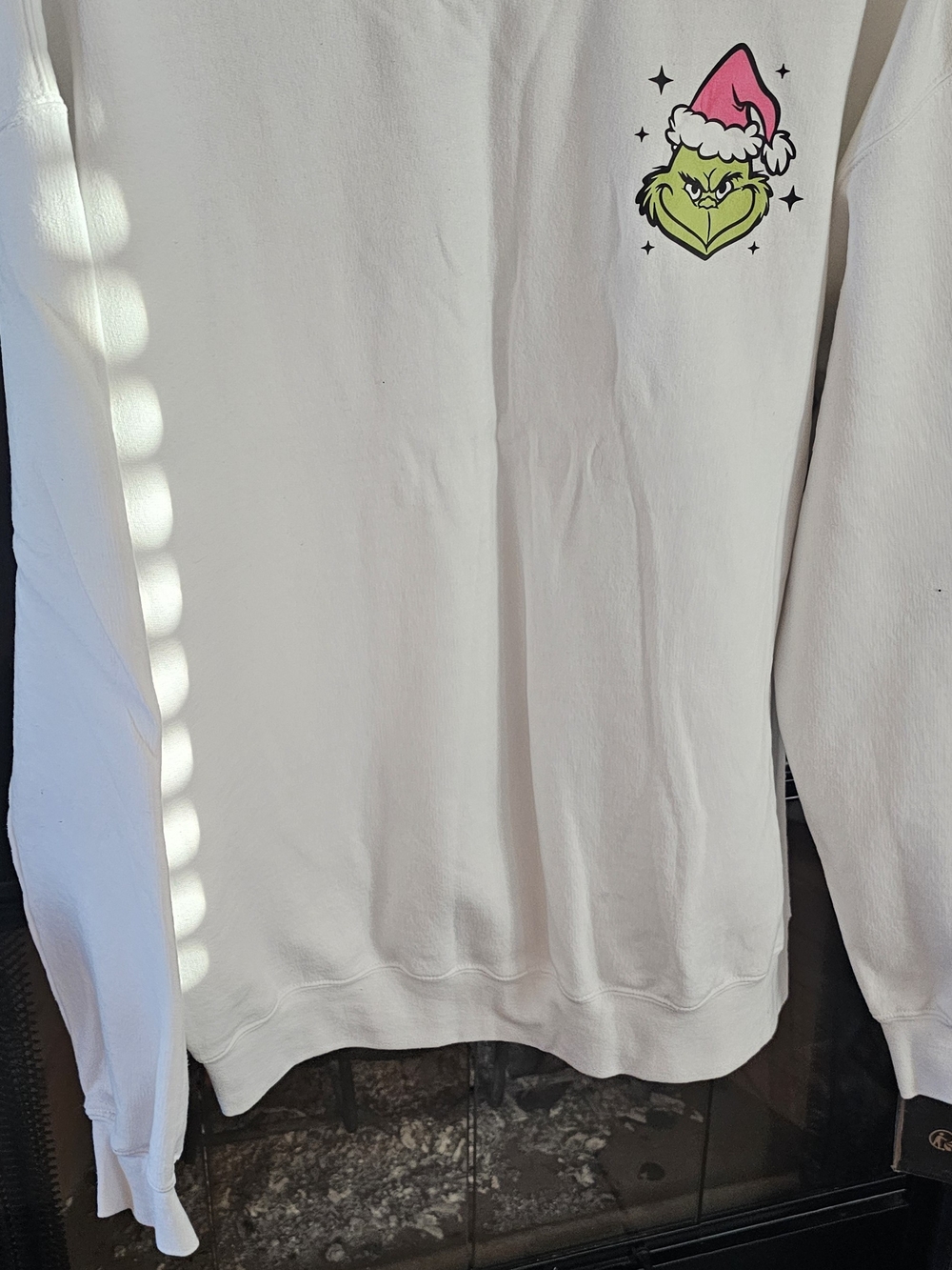 Gildan White Crewneck Sweatshirt with Pink-Trimmed Grinch Graphic